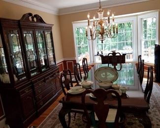 Table measures: 100" long (w/ one 24" wide leaf-comes w/ 2 leaves)
China cabinet measures: 72" long x 18" deep