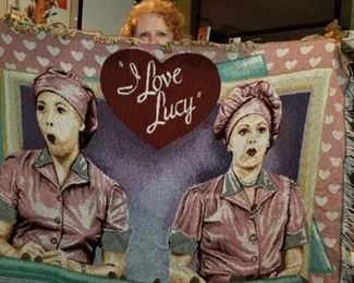 I Love Lucy throw with our redhead peeking over the top