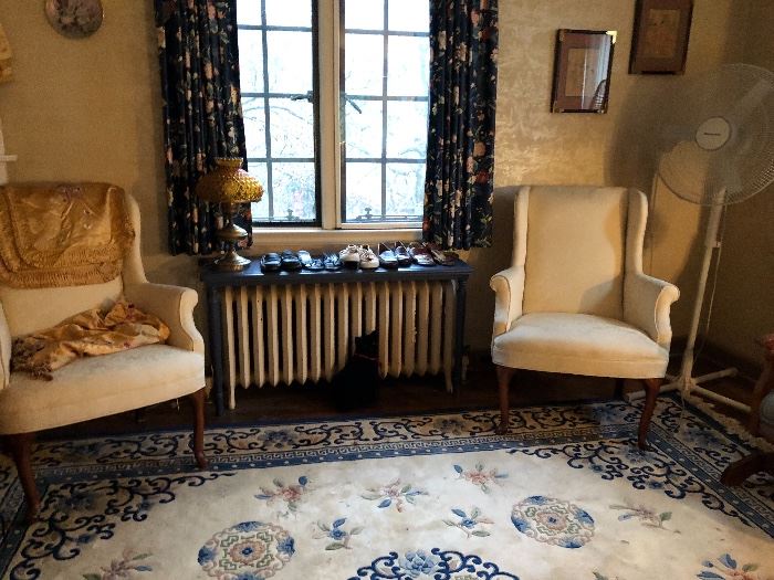 pair of wing chairs & Chinese wool rug