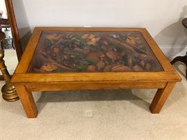 Big Sky Carvers Coffee Table. Very Unique!! You gotta see this in person. It's WAY cooler than the photo looks. Thats a total 3-D carving under the glass there.