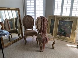 Chairs, mirror, art, oh my!