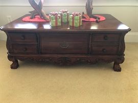 What is that? It's not a coffee table, it's not a parlor table -- it's not a table at all, is it? Is it a dresser that got put under a spell by a vengeful gypsy? Please come Thursday and tell me!