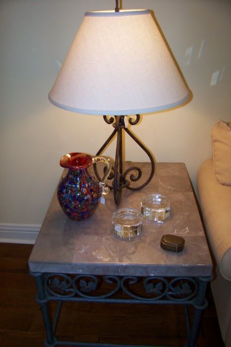 One of a pair, iron and marble end tables