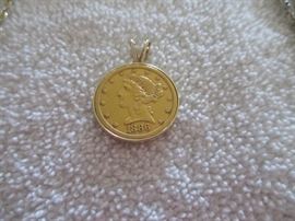 1886 $5 Gold Coin put into a pendant holder.