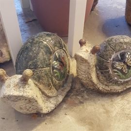 Many yard art, including pair of concrete snails 