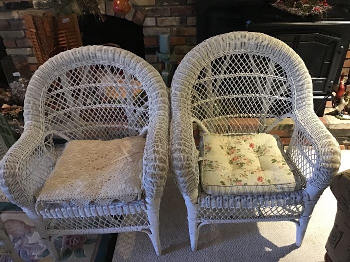 Another pair of vintage wicker chairs with cushions