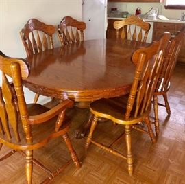 Wood dining room table with 6 chairs
