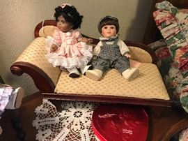 Wonderful Dolls sitting on this salesman sampler fainting couch.