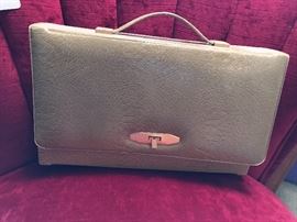 Vintage traveling makeup mirror and carrying case.