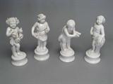 Italian porcelain Four Seasons statues.
