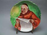 Crown Coronet artist signed plate, monk reading newspaper.