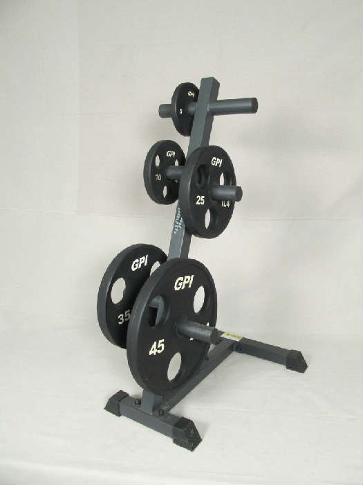 Set of free weights (4 x 45 lbs, 2 x 35 lbs, 2 x 25 lbs, 4 x 10 lbs, 2 x 5 lbs) and 8 arm tower.