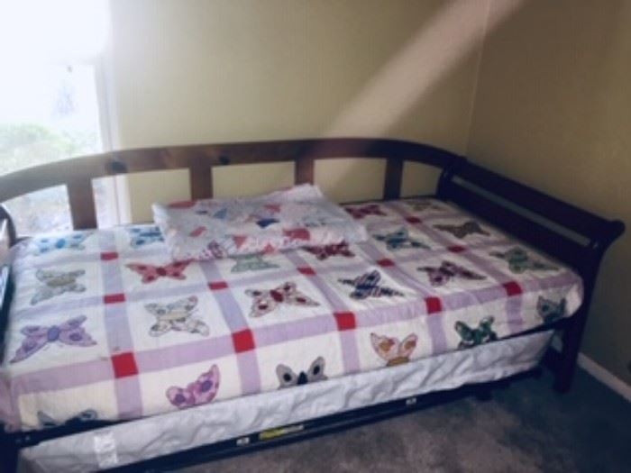 Trundle bed, two twin mattress, bottom mattress sits on metal frame and pulls out