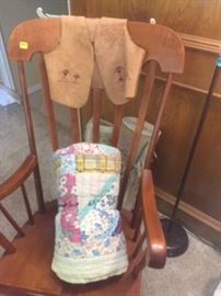 Maple rocking chair, very good condition, vintage quilts and childs leather indian motif vest (small)