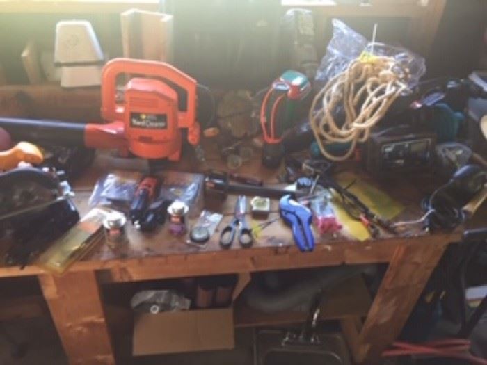 leaf blower, extension cords, sink, work bench and a maple work bench, RV supplies, electric hand tools