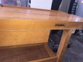 Maple wood working bench with peg hole top and 2 wood workers vises built-in, shelf underneath