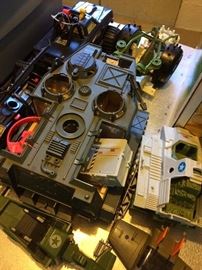 Lots of G I Joe vehicles and dolls and accessories