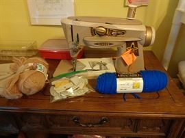 singer sewing machine in cabinet