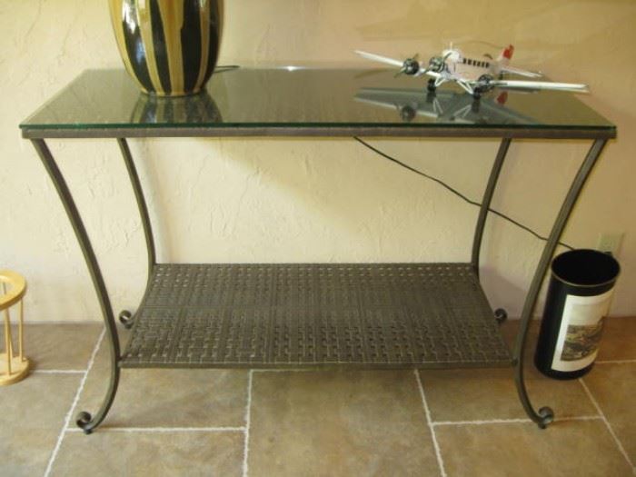 Windham cast aluminum console table with protective glass top