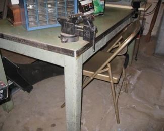vintage work table with vise attached
