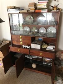 Oil Walnut Display cabinets with brass draw pulls and leather pulls on cabinet door