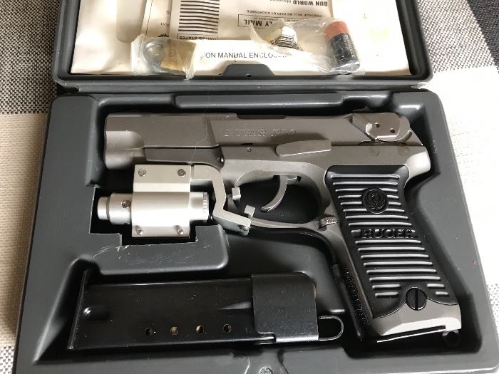 Ruger P89, 9mm with lazer sights and original case and paperwork 