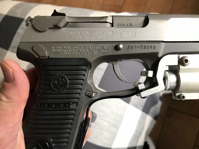 Ruger P89, 9mm with lazer sights and original case and paperwork