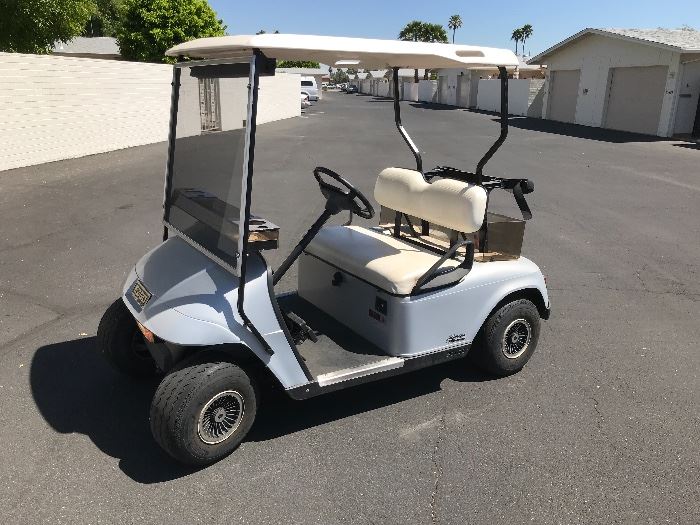 1998 EZ Go Golf Cart. 2 Brand new tires on back, Brand New battery. Must see, in excellent condition 