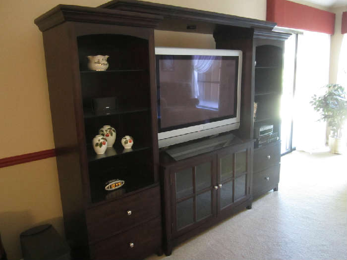 Lovely Entertainment Center, Large Plasma TV and Bose System.  Sold Separately