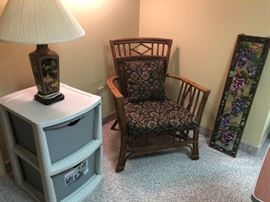 Wicker Chair, Lamp, Sterilite Storage Drawers
