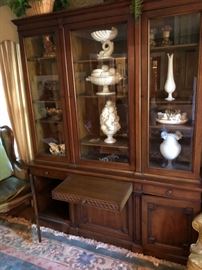 Drexel Heritage China Cabinet with 3 full opening doors and a pullout vallet. 3 cabinets onthe bottom