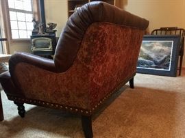 Side view of leather love seat sofa