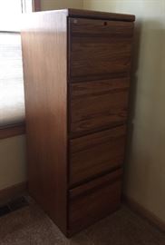 Wood four drawer file cabinet