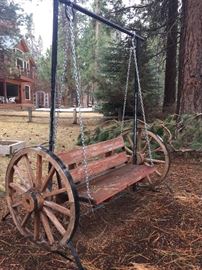 Wagon wheel outdoor swing