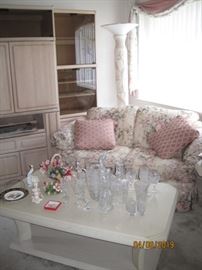 Contemporary Loveseat in pastel Florals, Tall Floor Lamp with Bird of Paradise Decoration, Polish and German Crystal, Capodimonte Items.