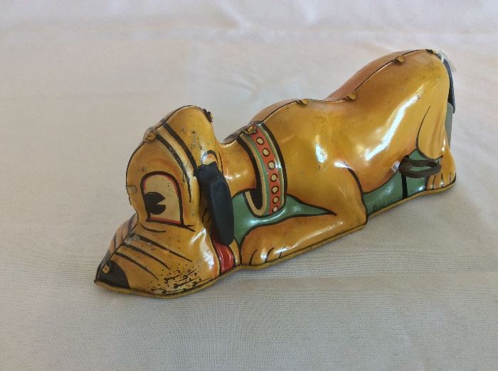 Vintage Walt Disney Pluto Wind Up Toy. 8 1/2" L.
