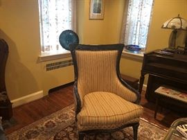 BEAUTIFUL UPHOLSTERED WING CHAIR WITH WOOD CARVED DETAILS