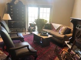 PAIR OF HENREDON LEATHER CHAIRS WITH CARVED WOOD DETAILING