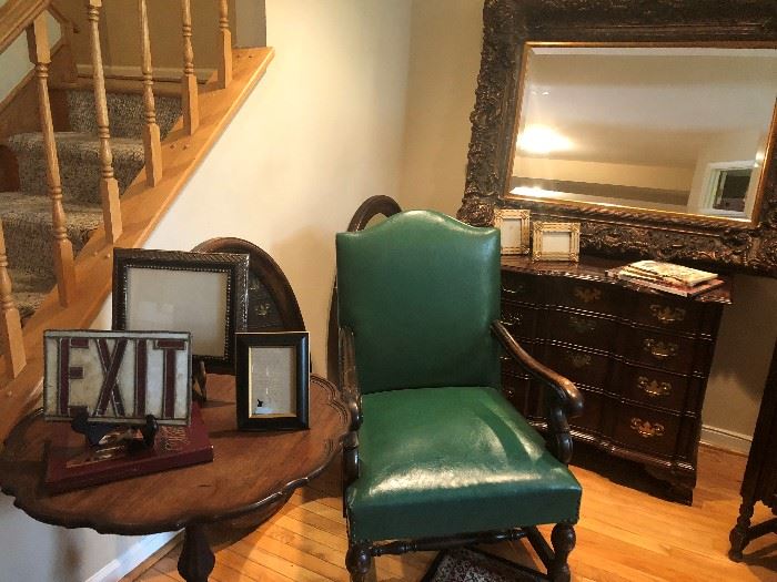 GREEN LEATHER CHAIR, PIE CRUST TABLE, ANTIQUE STAINED GLASS "EXIT" SIGN, ETHAN ALLEN LOW CHEST OF DRAWERS, HUGH ORNATE MIRROR