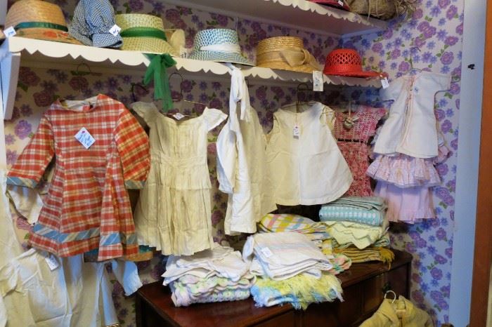 Vintage hats & more vintage children's clothing along with vintage baby blankets.