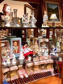Vintage dolls, display cabinets