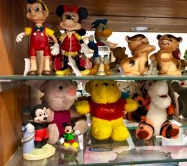Pinocchio, Winnie the Pooh, Piglet, Tigger, Mickey Mouse, and Minnie Mouse