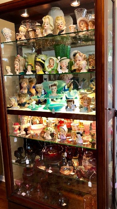 A stunning collection of Vintage Lady Head vases and aqua milk glass, unfortunately, this case isn’t for sale.