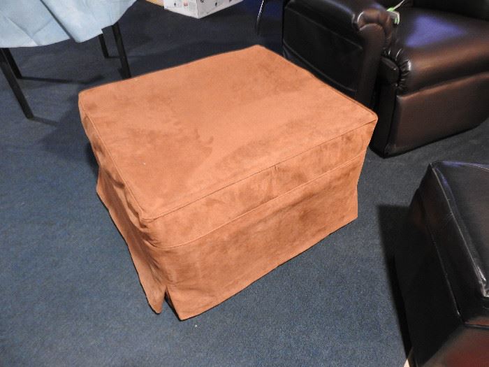 Ottoman folds out to make a bed