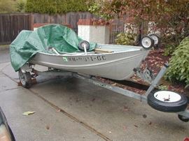 Boat, trailer, outboard motor. Ready to go