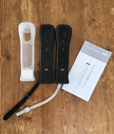 Wii remotes plus controller (two)