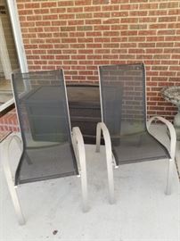 2 outdoor chairs and plastic trunk filled with cushions and garden items https://ctbids.com/#!/description/share/132031