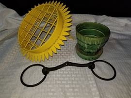 Vintage McCoy planter, metal bird feeder, and horse bit https://ctbids.com/#!/description/share/132026