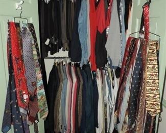 A closet JAMMED full of men's clothing including ....