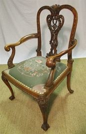 Ornate European carved arm chair